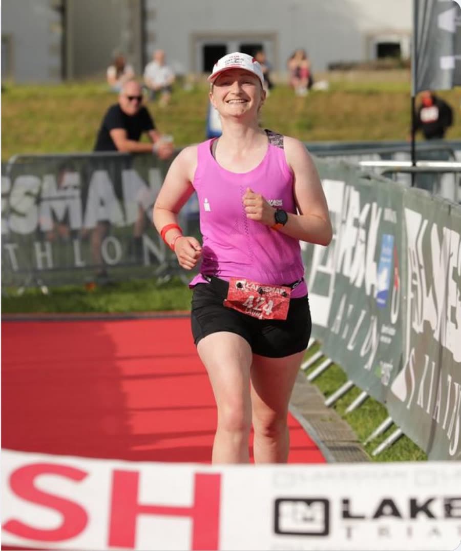 Laura running down the Lakesman finish chute