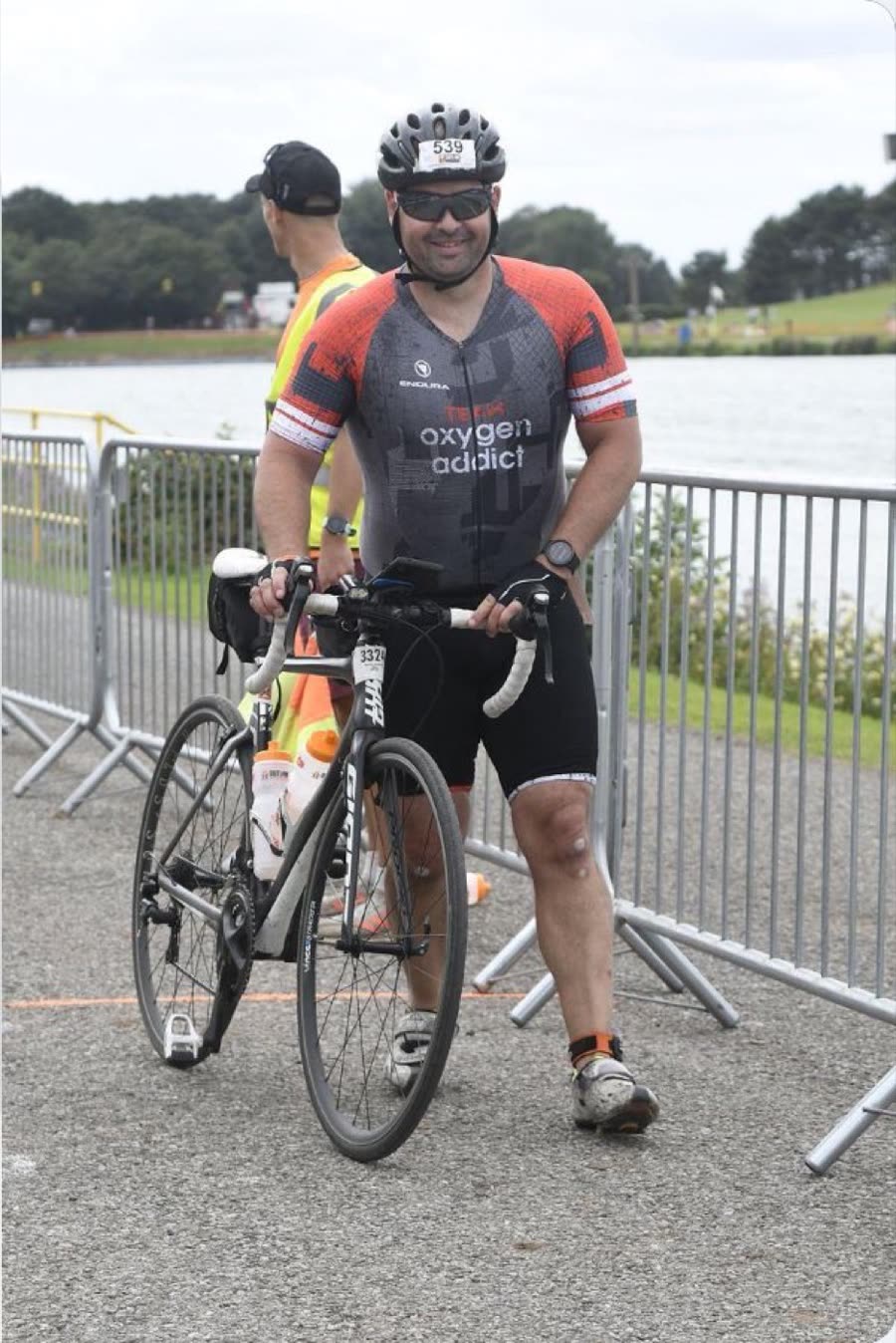 Matthew with his bike in Team Oxygenaddict kit at the Outlaw